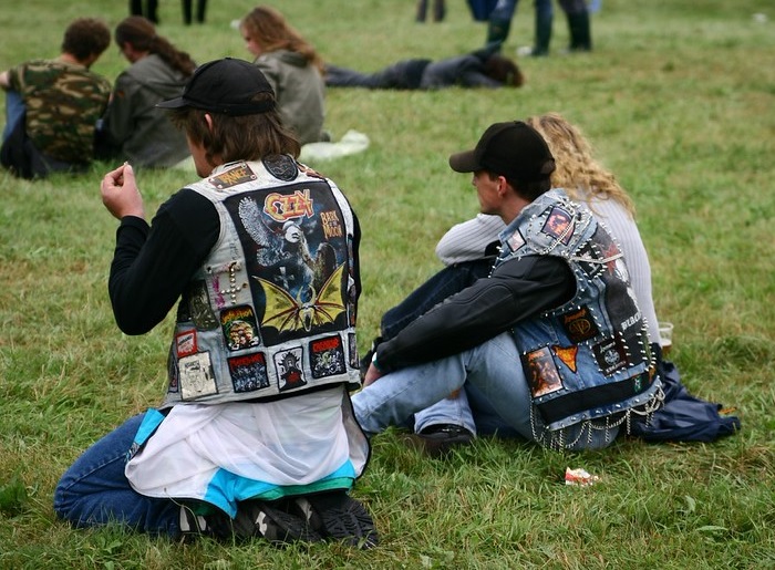 Metal fans wearing battle jackets with band patches